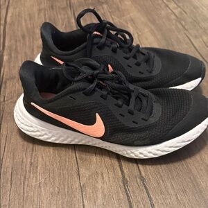 Nike Black Running Shoes with Coral Pink Swoosh